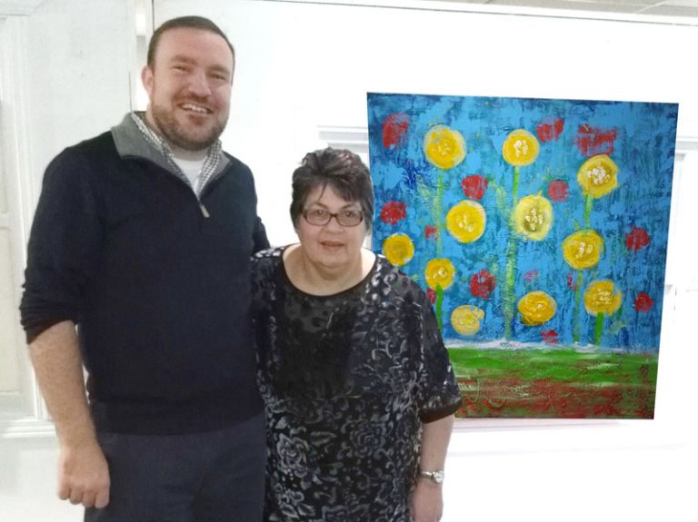 cropped Lynne and Eric with painting