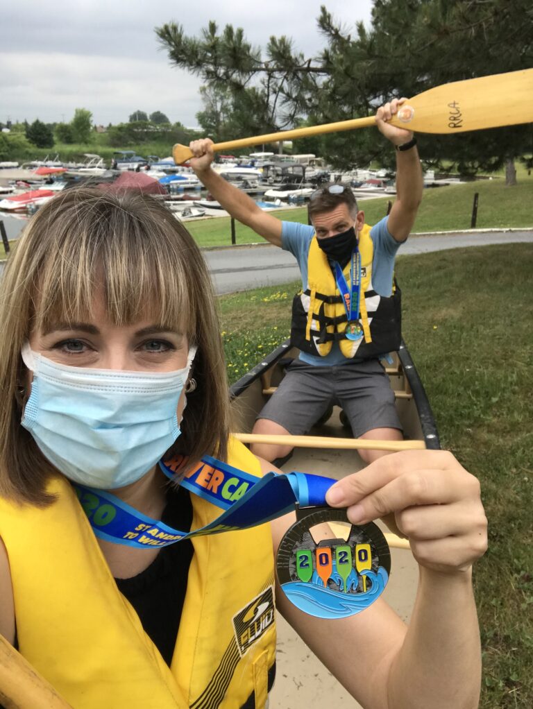 RRCA Race Coordinators, Lissa Deslandes and Phil Barnes, enjoy a virtual paddle near the Gray’s Creek Marina parking lot