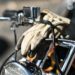photo of a glove on motorcycle handlebar