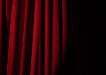 spotlight on a red curtain