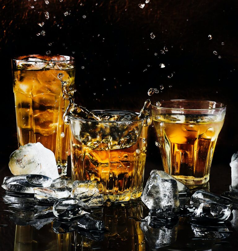 alcohol bar black background close up