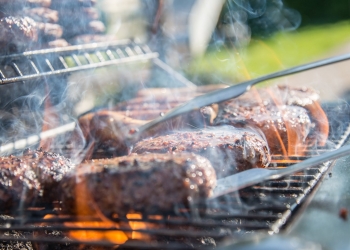 close photography of grilled meat on griddle