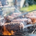 close photography of grilled meat on griddle