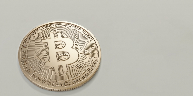 round gold colored bitcoin