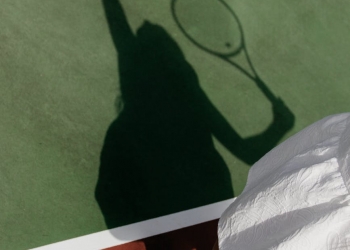 shadow of woman playing tennis
