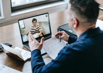 photo of professor teahcing his student