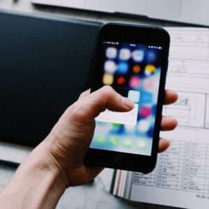 person holding black smartphone