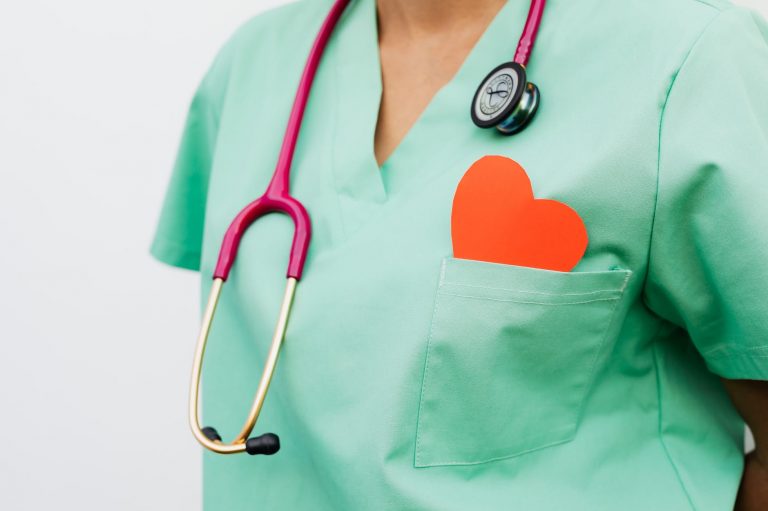 person wearing blue and black stethoscope