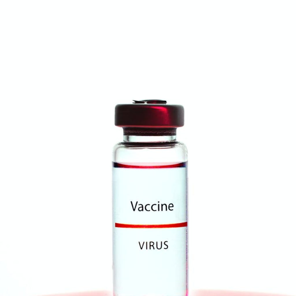 a vaccine vial on white background