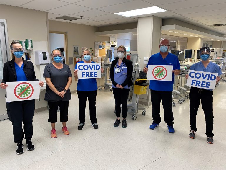 Staff in the Critical Care Unit celebrate having no COVID-19 patients for the first time since last year