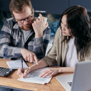 couple calculating all their bills