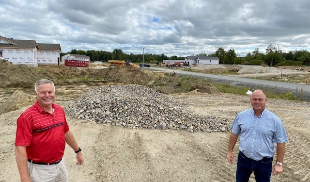Photo supplied by North Dundas

Photo (growth): Pictured, Director of Planning, Building and Enforcement Calvin Pol stands with Mayor Tony Fraser in the Wylie Creek Estates Subdivision in Hallville.