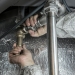 plumber installs pipe fittings