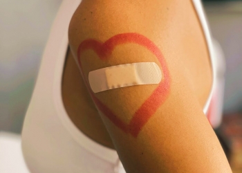 person wearing white and brown sandal