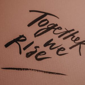 handwritten love people sand