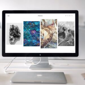 photo of imac near macbook