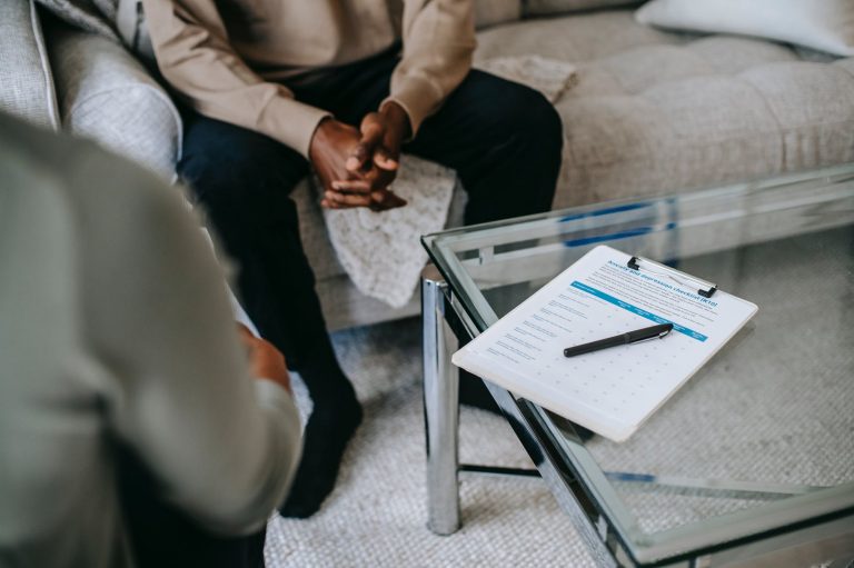 crop ethnic man in psychotherapy office