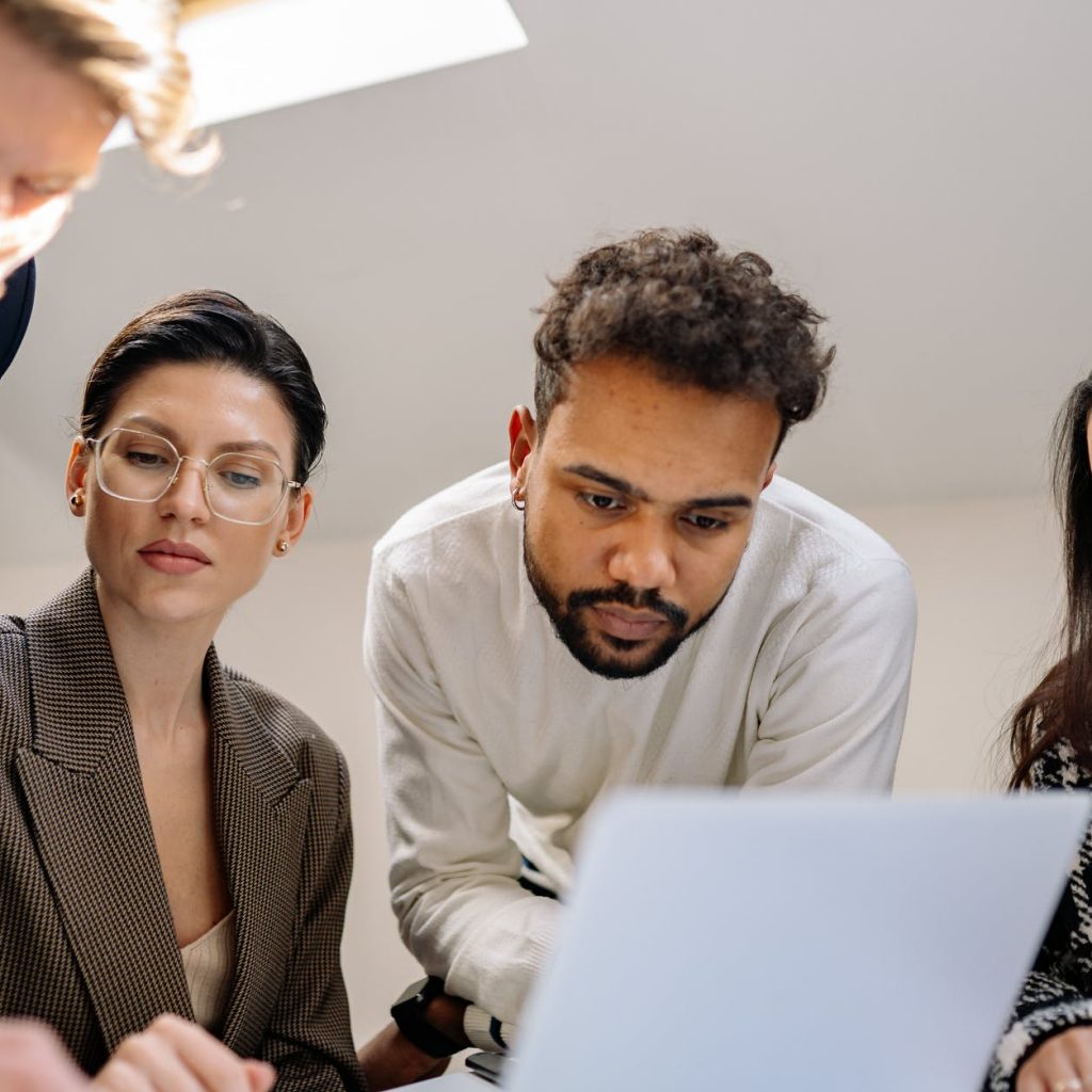 group of men and women working as a team