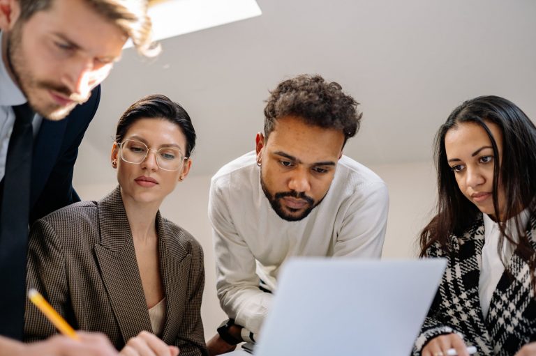 group of men and women working as a team