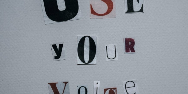 use your voice inscription on gray background