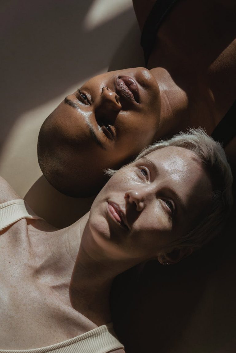 diverse women lying on floor