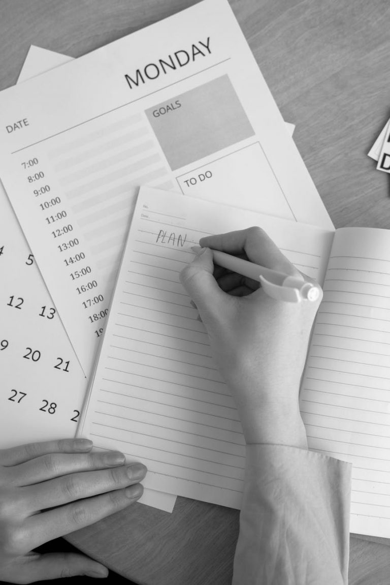 hand writing on notepad