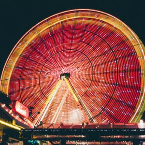 time lapse photo of red and yellow lighted ferris wheel