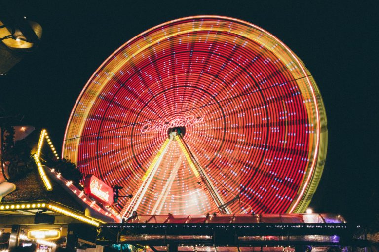 time lapse photo of red and yellow lighted ferris wheel
