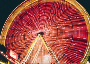 time lapse photo of red and yellow lighted ferris wheel