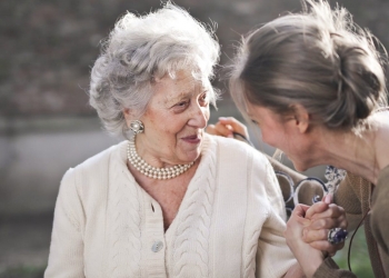 two adult women beside each other