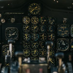 panel with gauges in cockpit of airplane