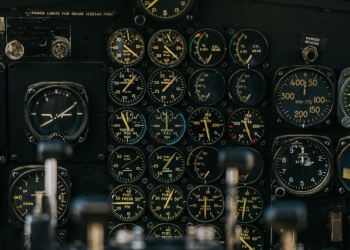 panel with gauges in cockpit of airplane