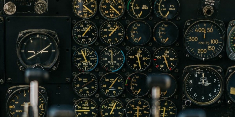 panel with gauges in cockpit of airplane