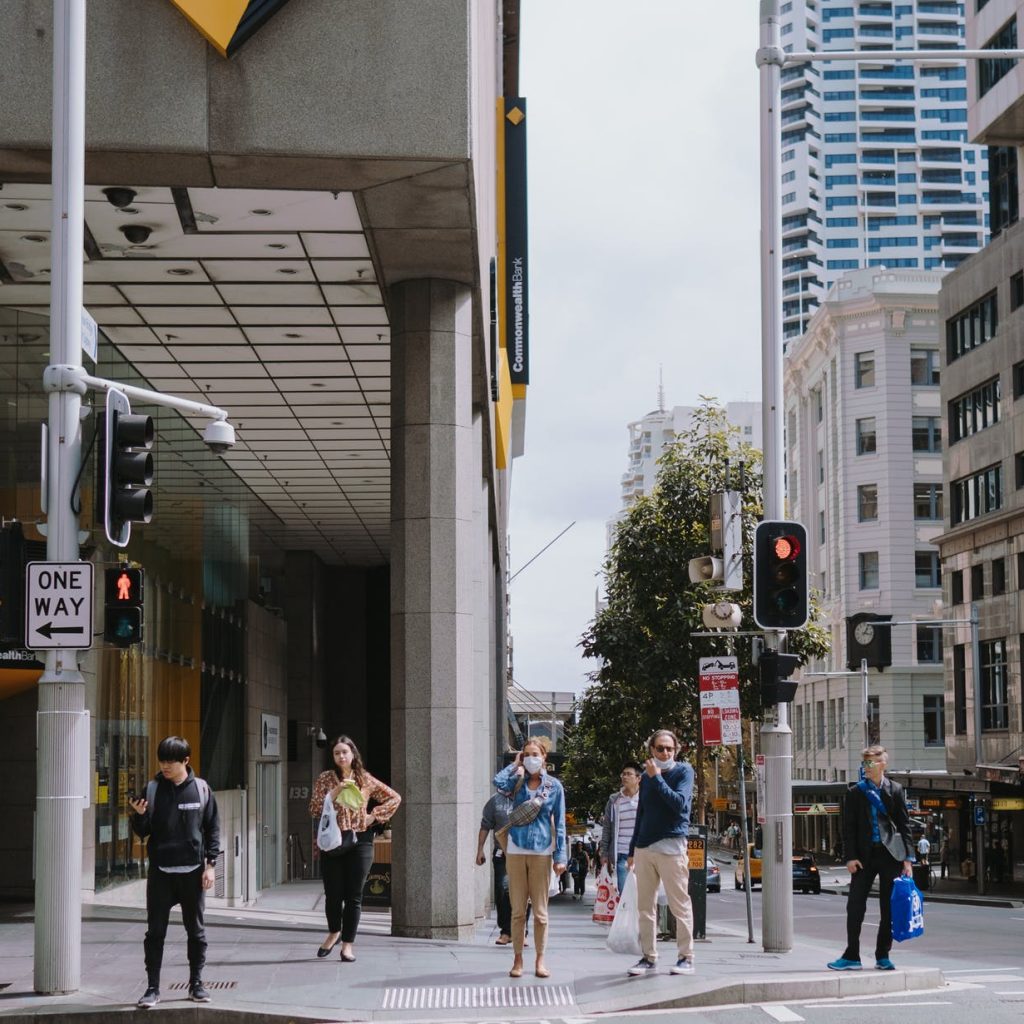 people walking on pedestrian lane