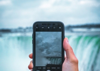 person holding black smartphone