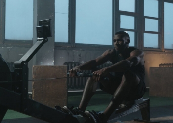 a man using a rowing machine