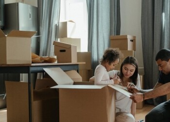 family unpacking after moving