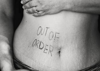 out of order text on persons belly