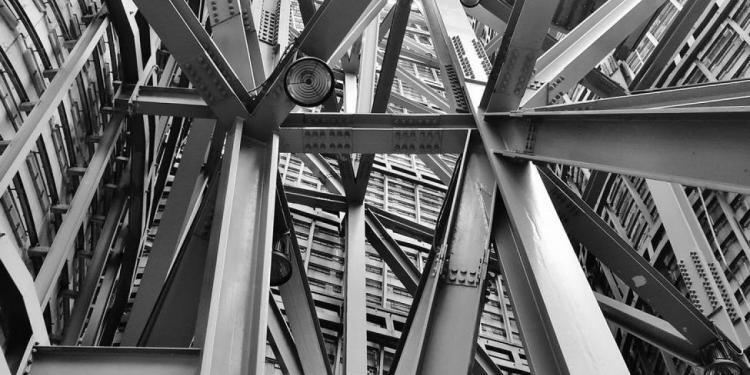 grayscale photography of scafoldings