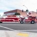 red and white fire truck on road - stock photo