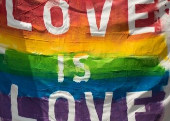 white and multicolored love is love banner