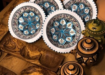 art photography of decorative plates and pots with lids