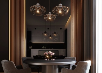 gray dining table under pendant lamps