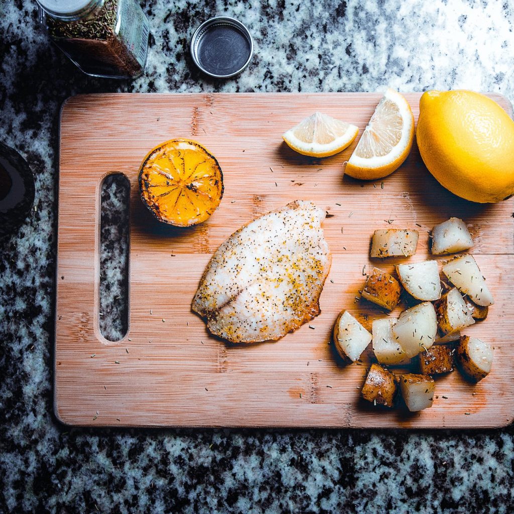 sliced lemon on board
