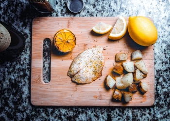 sliced lemon on board