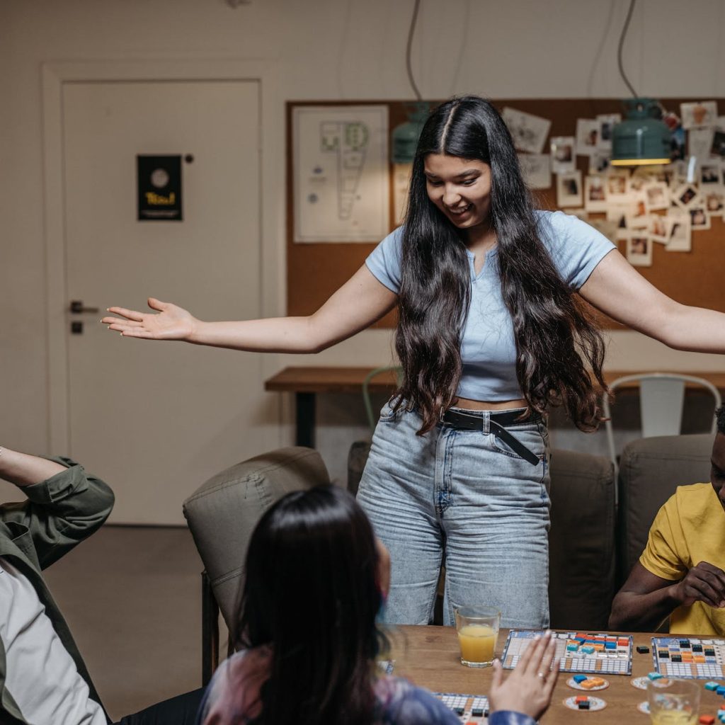 friends playing a board game together