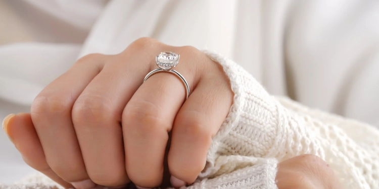 a person wearing an engagement ring