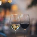 shallow focus photo of two wine glass