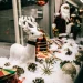 shop showcase festive decorations with shiny baubles and santa figurine