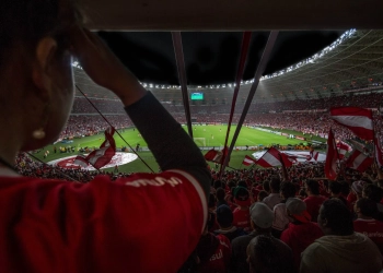 group of people watching soccer game